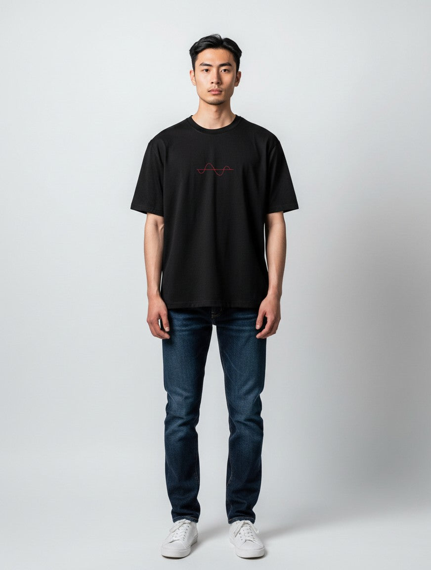 Born West black oversized terry knit t-shirt with a red embroidered wave graphic on the chest.