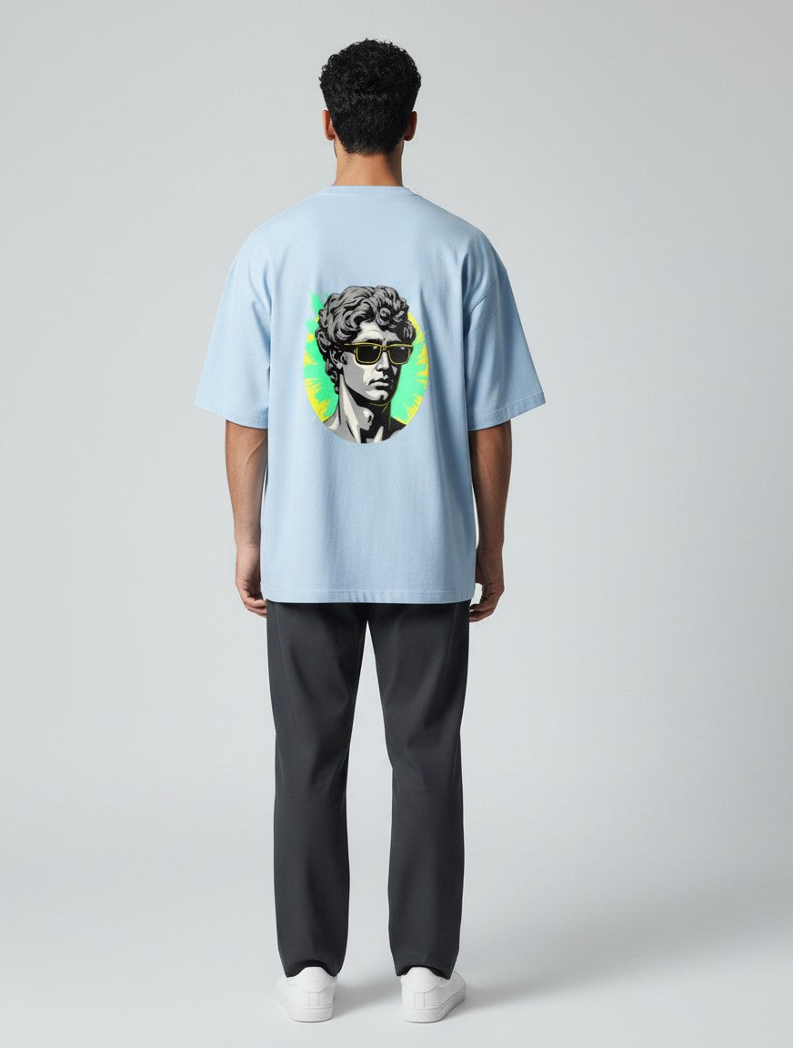Born West light blue oversized terry tee with a graphic print of a classical bust wearing sunglasses.