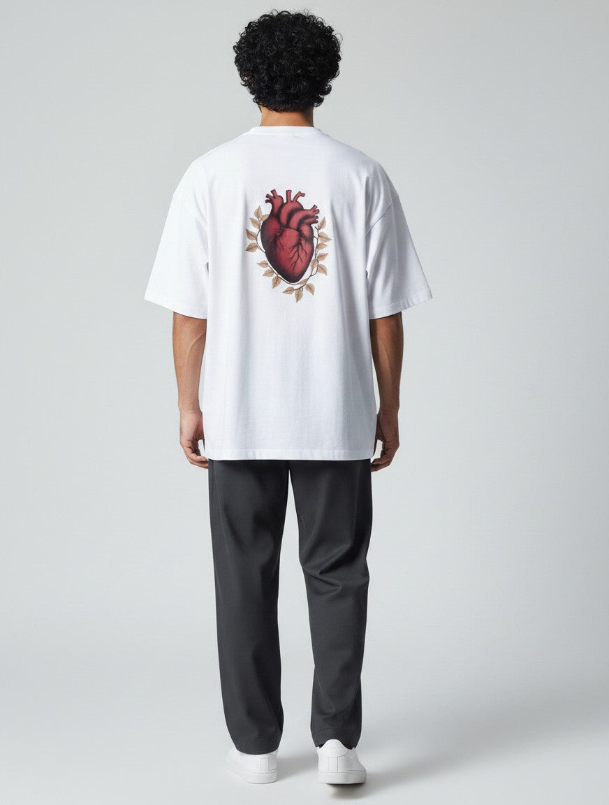 Born West white oversized terry tee with a vintage anatomical heart and vine graphic print on the back.