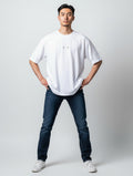 Born West white oversized terry tee with minimalist black cat ears graphic on chest. Heavyweight cotton-polyester blend.